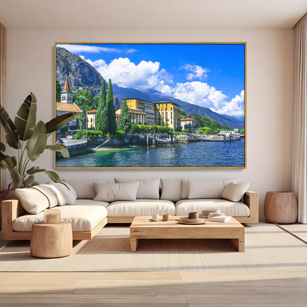 Tablou canvas cu peisaj urban pe malul lacului, in rama de aluminiu auriu, pe perete intr-un living
